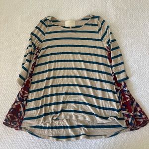 Anthropologie “Puella” swing top with contrasting side panels